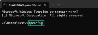 The ipconfig command in Command Prompt.